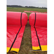 Inflatable flood tube wall barrier for flood control